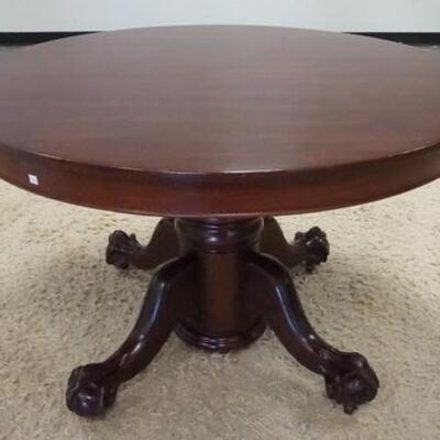 1047	MAHOGANY PEDESTAL TABLE W/MASSIVE BALL & CLAW FEET, HAS TWO 9 1/4 IN LEAVES, 48 1/4 IN DIAMETER
