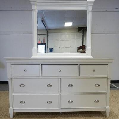 1082	MAGNUSSEN 7 DRAWER LOW CHEST W/MIRROR, MIRROR IS BEVELED, CHEST IS 64 IN WIDE X 37 1/4 IN HIGH, MIRROR IS 43 IN WIDE X 38 IN HIGH
