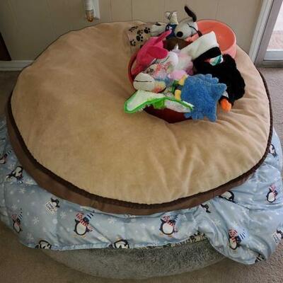 5520 â€¢ Two large dog beds and miscellaneous dog toys