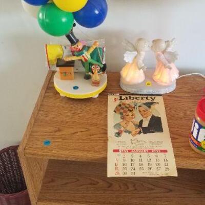 Vintage clown with balloons, it is a night light, also there is a calendar from 1933