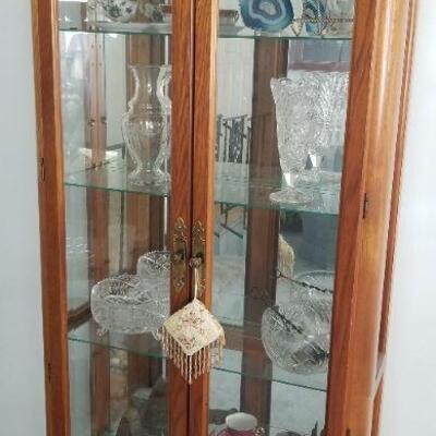Very nice curio cabinets, in very good condition; glass shelves