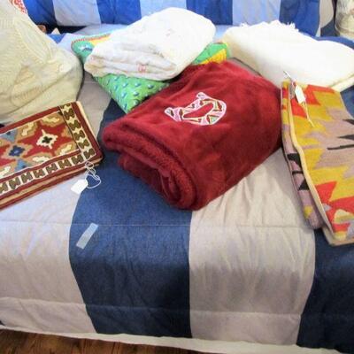 We have beautiful linens!  Including down comforters & pillows.  2 nice twin beds available with pristine new mattresses. 