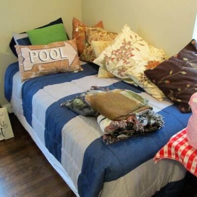 We have beautiful linens!  Including down comforters & pillows.  2 nice twin beds available with pristine new mattresses. 