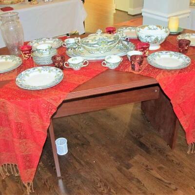 Very nice solid contemporary table - comes apart for moving.  Beautiful table runners and more in our linen section.