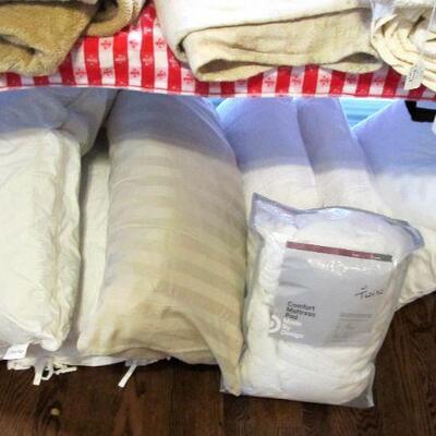 We have beautiful linens!  Including down comforters & pillows