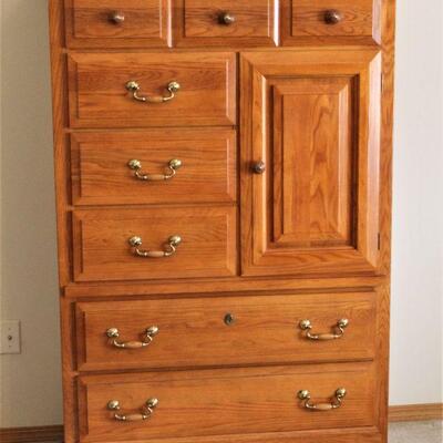Bassett Oak Armoire is in excellent condition.