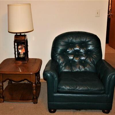 Green leather chair.
