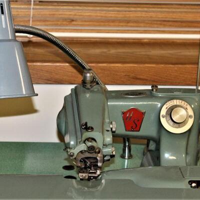 Commercial US blind stitcher with work table is ready to work.

