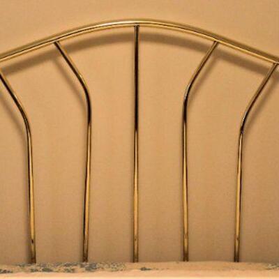 Brass headboard with porcelain finials.