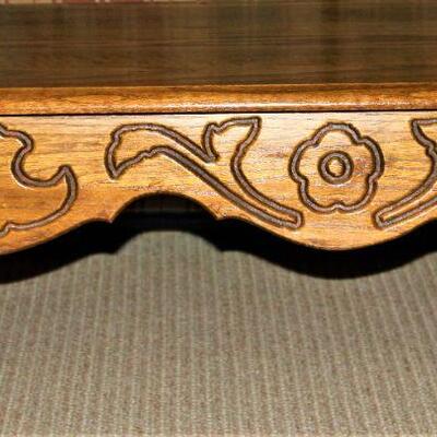 Solid wood and nicely crafted coffee table and end table.
