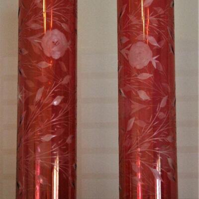 Etched glass floral vases.