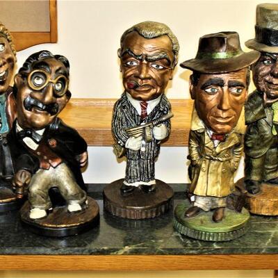 Harpo and Groucho Marx, Edward G. Robinson, Humphrey Bogart and W.C. Fields treasure jeweled statues.  Would make a nice addition to your...
