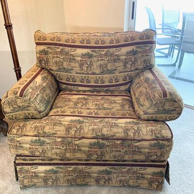 Oversized upholstered chair in elephant print is 39