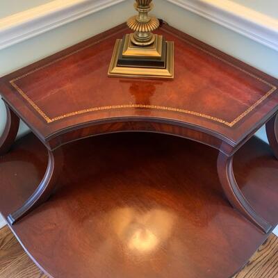 mahogany corner table with leather insets