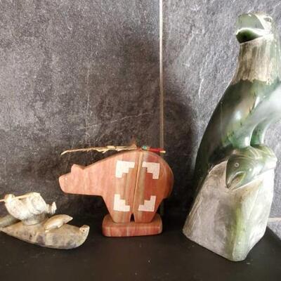 1032	

3 Carved Stone Figurines
Measurements Range Approx