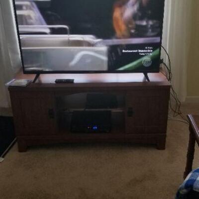 TV cabinet and flat screen TV, sold separately