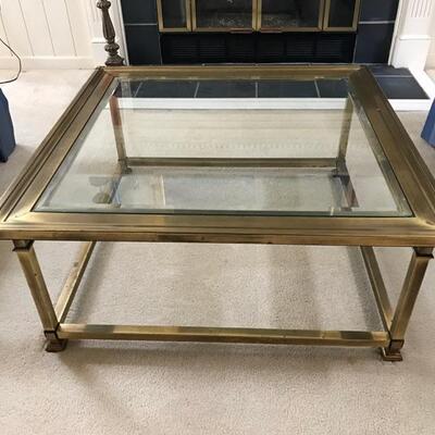 Brass and glass coffee table $380
36