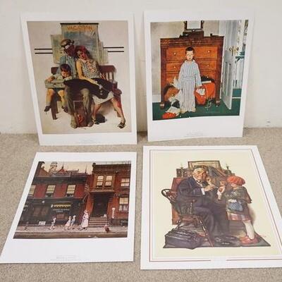 1079	LOT OF FOUR NORMAN ROCKWELL ART POSTERS. LOT INLCUDES *TIRED BUT HAPPY* *THE TRUTH ABOUT SANTA* *WALKING TO CHURCH* & *THE DOCTOR &...