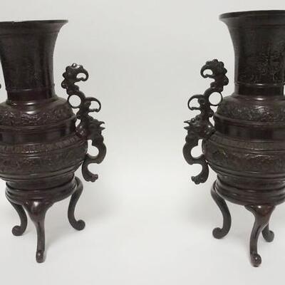 1010	PAIR OF BRONZE ASIAN FOOTED URNS, 11 IN HIGH
