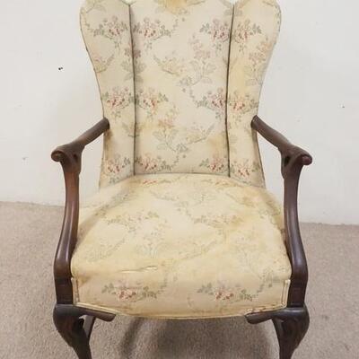 1062	UPHOLSTERED ARM CHAIR W/PAW FEET & UNUSUAL CURVED ARMS, UPHOLSTERY STAINED
