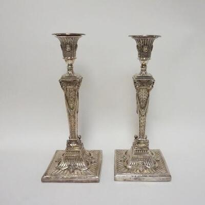 1037	PAIR OF OUTSTANDING SILVER CANDLESTICKS WITH TOUCH MARKS AND INTRICATELY DECORATED WITH MASKS, BUSTS AND CAMEOS, 12 IN HIGH
