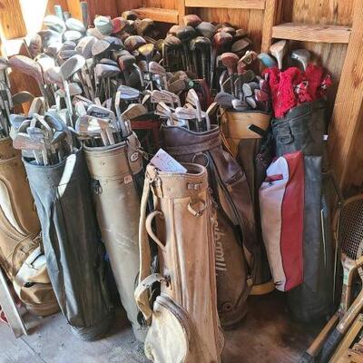 4500	

11 Golf Bags with Clubs and Tennis Rackets
Brands Include Wilson, Dunlop, Spalding, MacGregor, Palm Springs, and more
