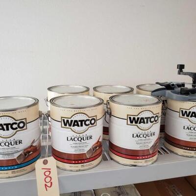 1002	

7 Cans Of Watco Clear Lacquer And Poor Lid
All But On Cans Are New. 1 Can Of Satin, 4 Cams Of Gloss, And 2 Cans Of Semi Gloss