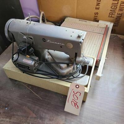 5018	

Kenmore Sewing Machine And Paper Cutter
Kenmore Sewing Machine And Paper Cutter
