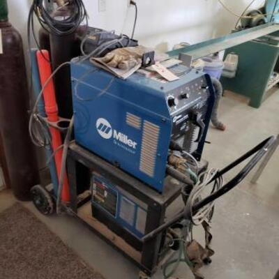 118	

Miller Syncrowave Tig Welder, Cart, Argon Tank, And Miller Coolmate
Cart Measures Approx: 45