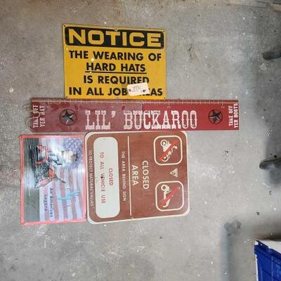2004	

Three Metal Signs And One Wood Sign
Ranging From Sizes: 17