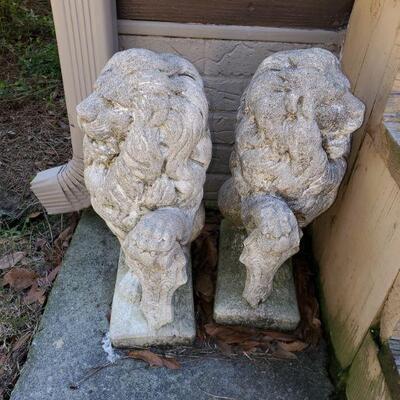 2 stone lion garden statues. Both measure 22