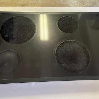 Magic Chef 4 burner black electric stove top counter insert. Unable to test but client said it is in working condition....