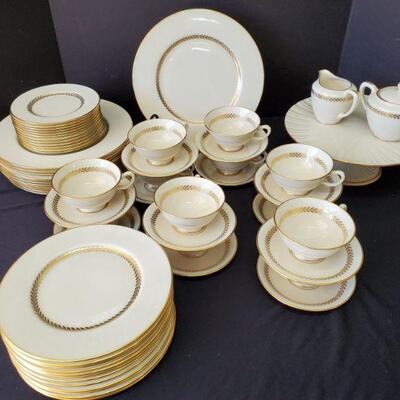 Gorgeous set of vintage Lenox Imperial Service for 12. China is an off white with gold leaves around center of plate and a gold trim...