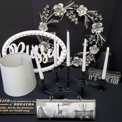 Beautiful black and white decor for your home. Candleholder is 3 pieces and holds 7 candles, shortest votive is 3