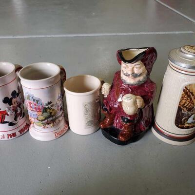 1918	

4 Mugs And Beer Stein
4 Mugs And Beer Stein