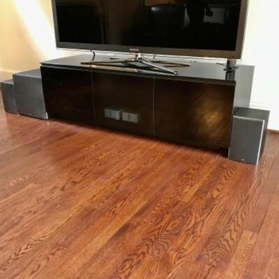 Black Lacquered TV Stand 60 3/4'  W, 21 3/4' D, 19 1/2' H. $200