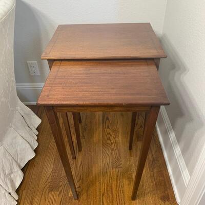 Vintage 2PC nesting table set. Large table measures 19.5" x 16" x 27". Small table measures 16" x 16" x 26"