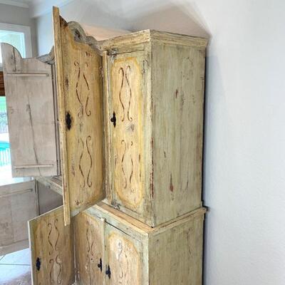Hand painted distressed 2PC imported cabinet. Bottom piece measures 72" wide and 36.5" high. Top piece measures 69" wide...