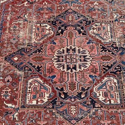 Vintage rug measures 106" x 144"