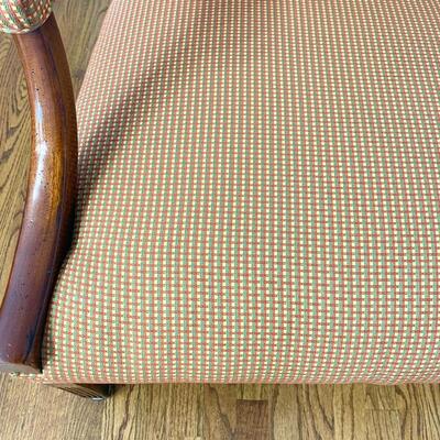Red/green/gold upholstered wood arm chair measures 29