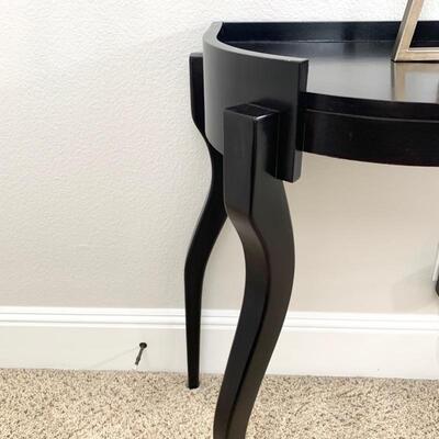 Contemporary console table measures 48.5
