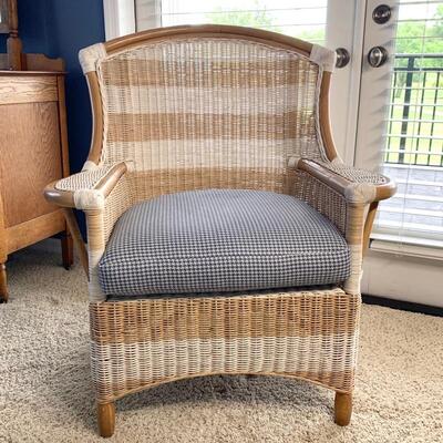 Striped wicker chair with houndstooth seat cushion measures 34