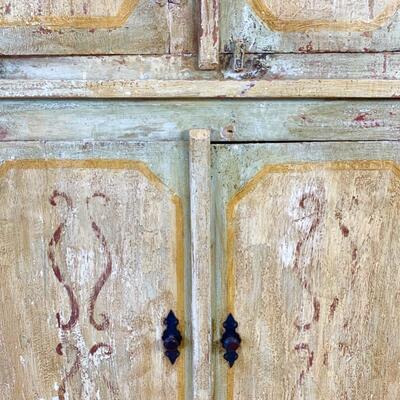 Hand painted distressed 2PC imported cabinet. Bottom piece measures 72" wide and 36.5" high. Top piece measures 69" wide...