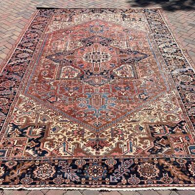 Vintage rug measures 106" x 144"