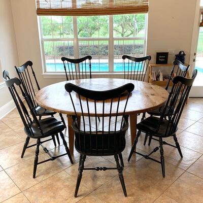 Round waxed pine custom table (with removable lazy-suzan) shown with vintage fan-back Windsor chairs. The custom table has a beautiful...