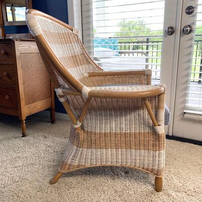 Striped wicker chair with houndstooth seat cushion measures 34