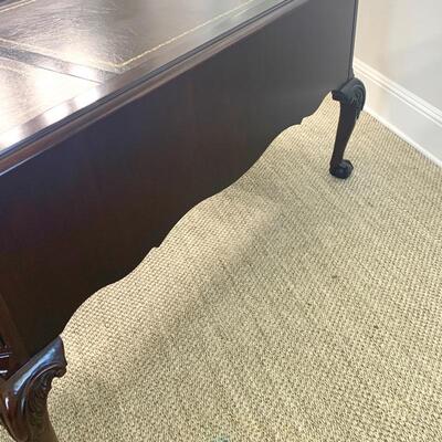 Leather top traditional desk with finished back measures 58" x 29"
