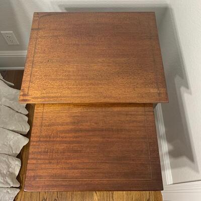Vintage 2PC nesting table set. Large table measures 19.5" x 16" x 27". Small table measures 16" x 16" x 26"