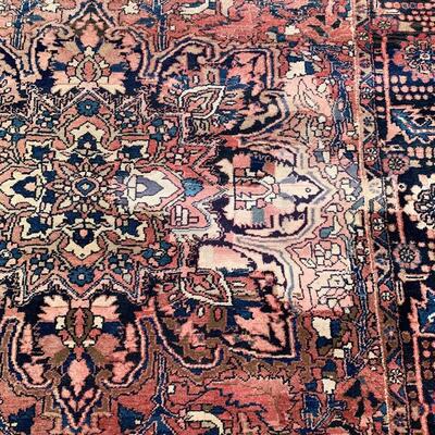 Vintage rug measures 96" x 136"