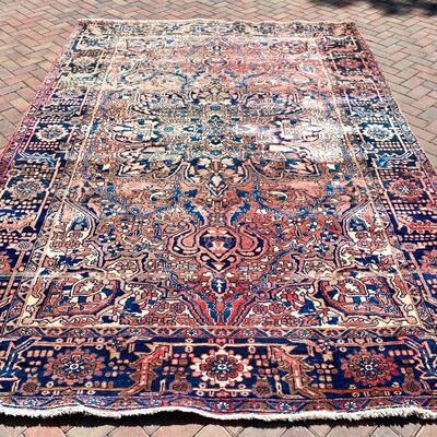 Vintage rug measures 96" x 136"